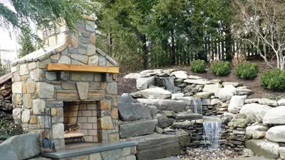 Perry Hall / Baltimore County Outdoor Fireplace with Waterfall and Patio Photo